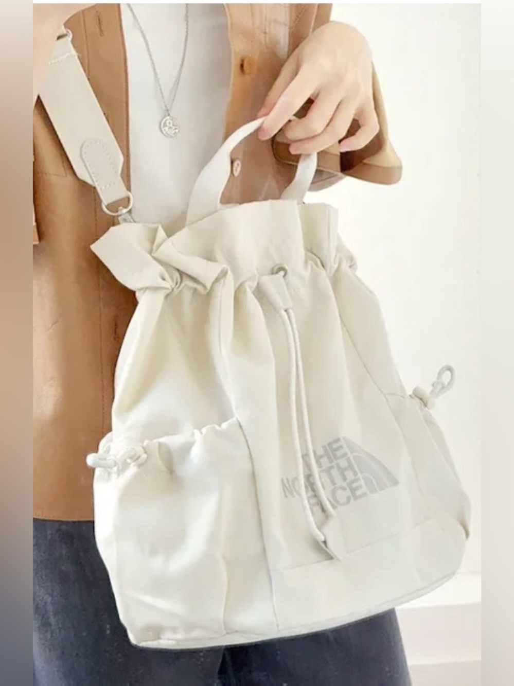 The North Face tote bag purse with side pockets crossbody adjustable strap beige